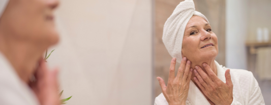 Satisfied woman with healthy, glowing skin.