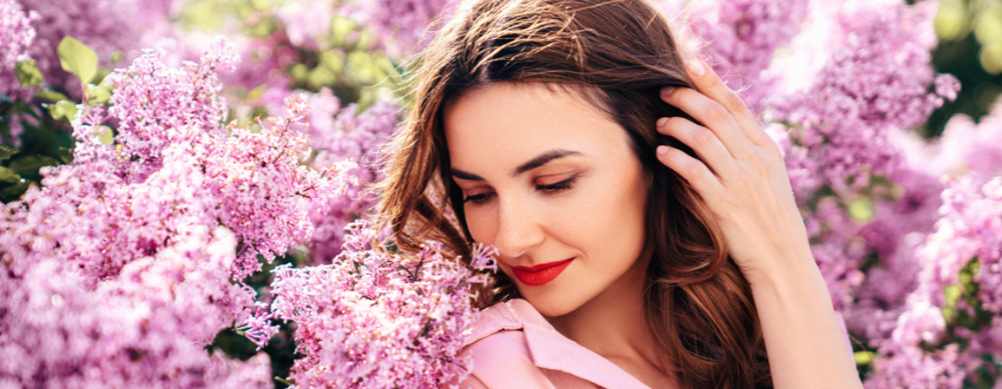 Satisfied woman with healthy, glowing skin.