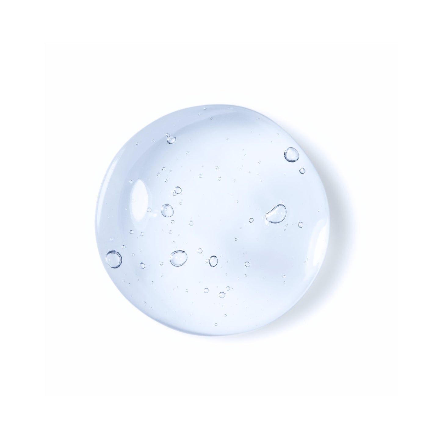 Clear gel serum drop with air bubbles, on white background