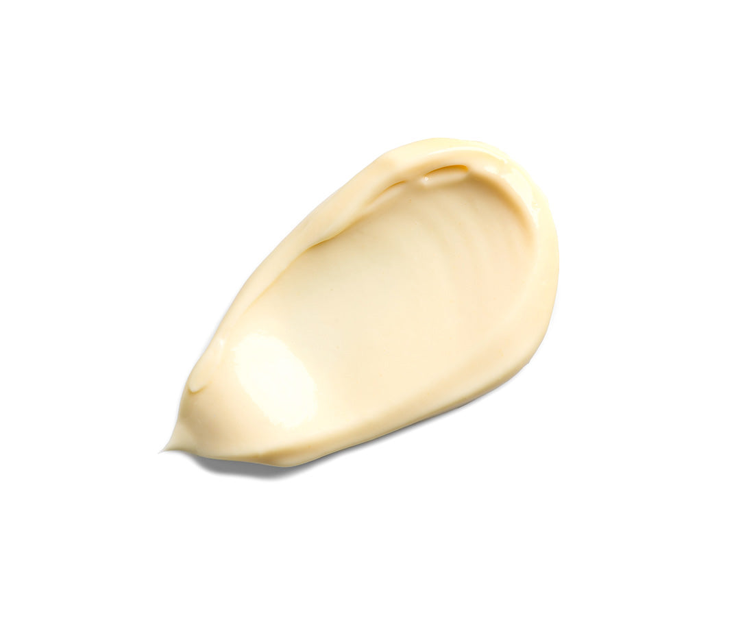 Pale yellow cream swatch, smooth texture