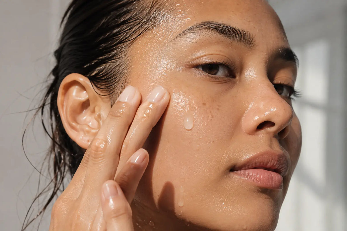 Applying a hydrating serum to damp skin for plumper-looking hydration