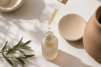 Peptide serum dropper over a clean skincare flatlay illustrating peptides in skincare, The A Method