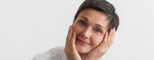 Satisfied woman with healthy, glowing skin.