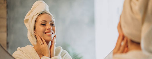 Satisfied woman with healthy, glowing skin.