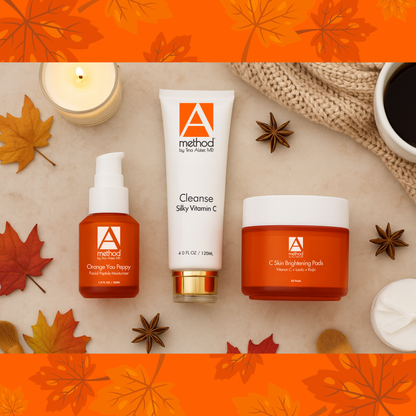 Flat lay of skincare products on fall theme table
