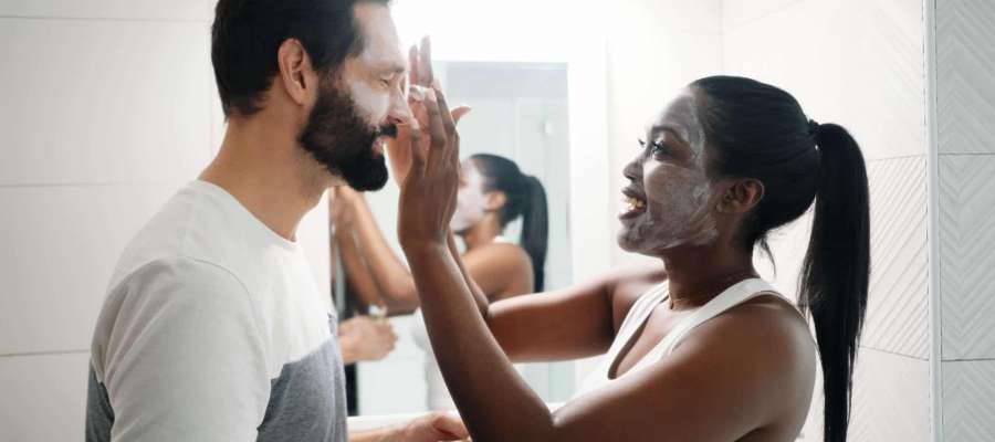Woman,Applying,Beauty,Mask,And,Skin,Cleanser,To,Man